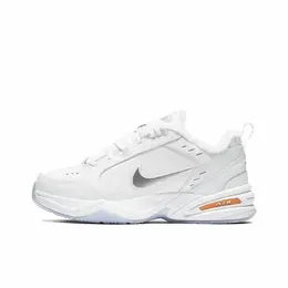 NIKE: Белые кроссовки Air Monarch IV