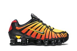 Nike: Оранжевые кроссовки  Shox TL