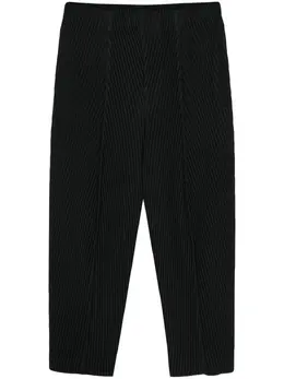 Homme Plissé Issey Miyake: Чёрные брюки 