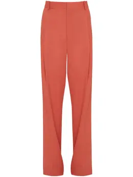 Victoria Beckham: Оранжевые брюки 