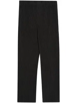 Homme Plissé Issey Miyake: Тёмные брюки 