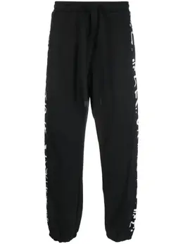 Versace Jeans Couture: Брюки в полоску 