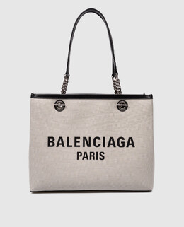 Balenciaga: Бежевая сумка Free