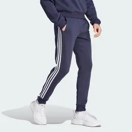 adidas: Спортивные брюки  Essentials