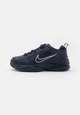 Nike: Розовые кроссовки Air Monarch IV