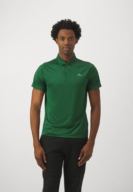 Lacoste: Зелёное поло 