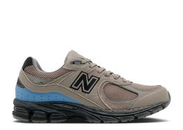 New Balance: Коричневые кроссовки  2002R