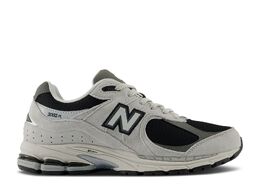 New Balance: Чёрные кроссовки  2002R