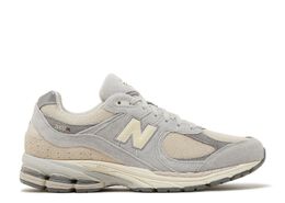 New Balance: Серые кроссовки  2002R