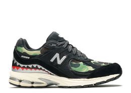 New Balance: Чёрные кроссовки  2002R