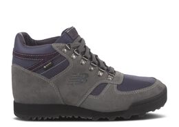 New Balance: Серые кроссовки 