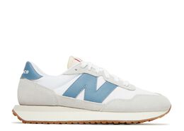 New Balance: Серые кроссовки 