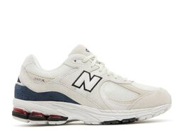 New Balance: Бежевые кроссовки  2002R