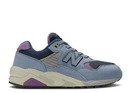 New Balance: Серые кроссовки 