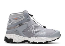 New Balance: Серые кроссовки 
