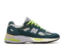 New Balance: Зелёные кроссовки 