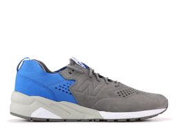 New Balance: Серые кроссовки 
