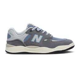 New Balance: Серые кроссовки  1010