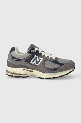 New Balance: Серые кроссовки 