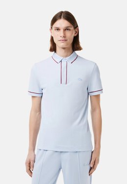 Lacoste: Фиолетовое поло 