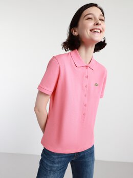 Lacoste: Розовое поло 