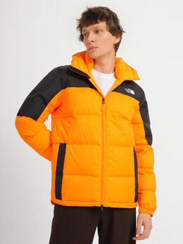 The North Face: Оранжевый пуховик 