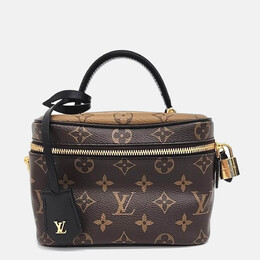 Louis Vuitton: Коричневая сумка 