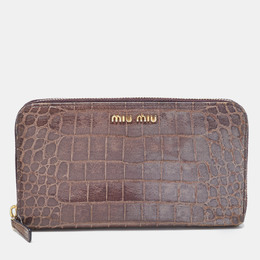 Miu Miu: Фиолетовый кошелёк 