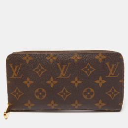 Louis Vuitton: Коричневый кошелёк Zippy