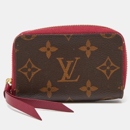 Louis Vuitton: Коричневый кошелёк  Zippy