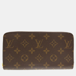 Louis Vuitton: Коричневый кошелёк  Zippy