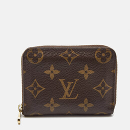 Louis Vuitton: Коричневый кошелёк Zippy