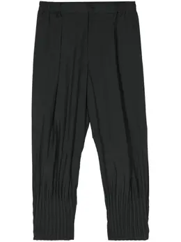 Homme Plissé Issey Miyake: Чёрные брюки 