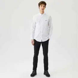 LACOSTE: Классические брюки 