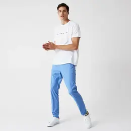 LACOSTE: Голубые брюки 