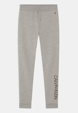 Calvin Klein Jeans: Светлые брюки 