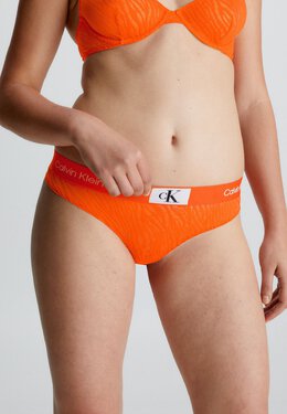 Calvin Klein Underwear: Оранжевые трусы 