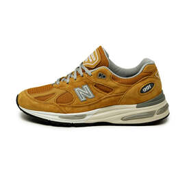 New Balance: Жёлтые кроссовки 
