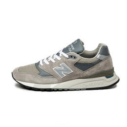 New Balance: Серые кроссовки 