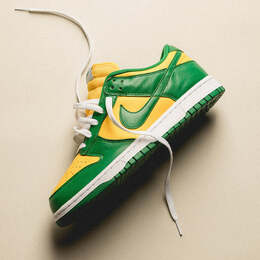 Nike: Серые кроссовки  Dunk Low SP