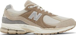 New Balance: Бежевые кроссовки  2002R