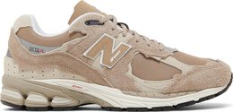 New Balance: Коричневые кроссовки  2002R