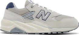 New Balance: Серые кроссовки 