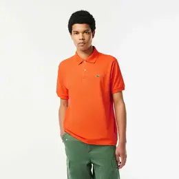 LACOSTE: Оранжевое поло 