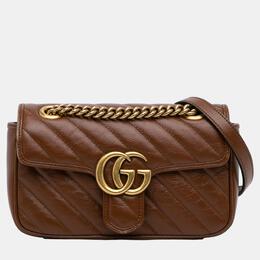 Gucci: Коричневая сумка GG Marmont