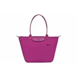 Longchamp: Розовая сумка