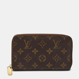 Louis Vuitton: Коричневый кошелёк  Zippy