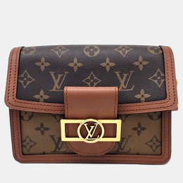 Louis Vuitton: Коричневая сумка 