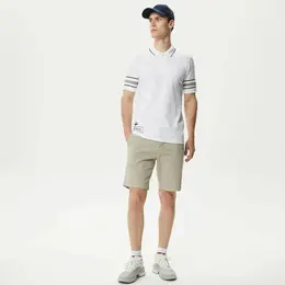 LACOSTE: Бежевые шорты 