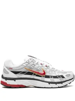 Nike: Серебристые кроссовки 